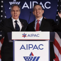 U.S. Secretary of State Antony Blinken (L) is welcomed by Aipac President Michael Tuchin at the committee’s policy summit in Washington on 5 June 2023 (Chip Somodevilla/Getty Images/AFP/MiddleEastEye)